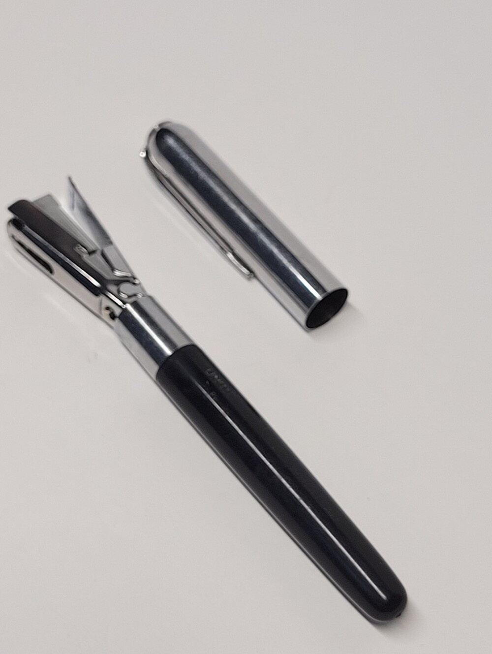 Black and Silver Men’s Pen-Style Pocket Stapler